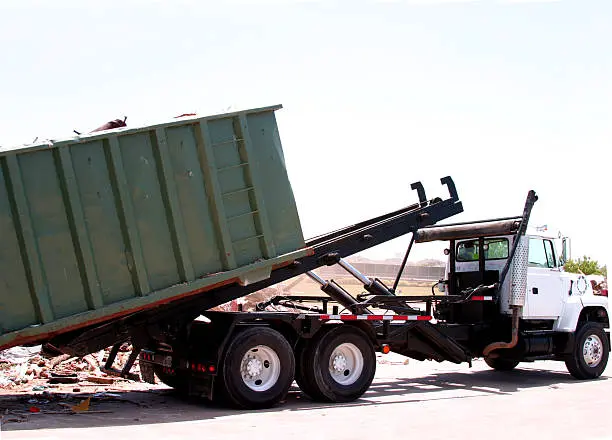 A cargo truck on a highway, symbolizing the efficiency and flexibility of road transport in delivering goods across regions and supporting global trade and commerce.